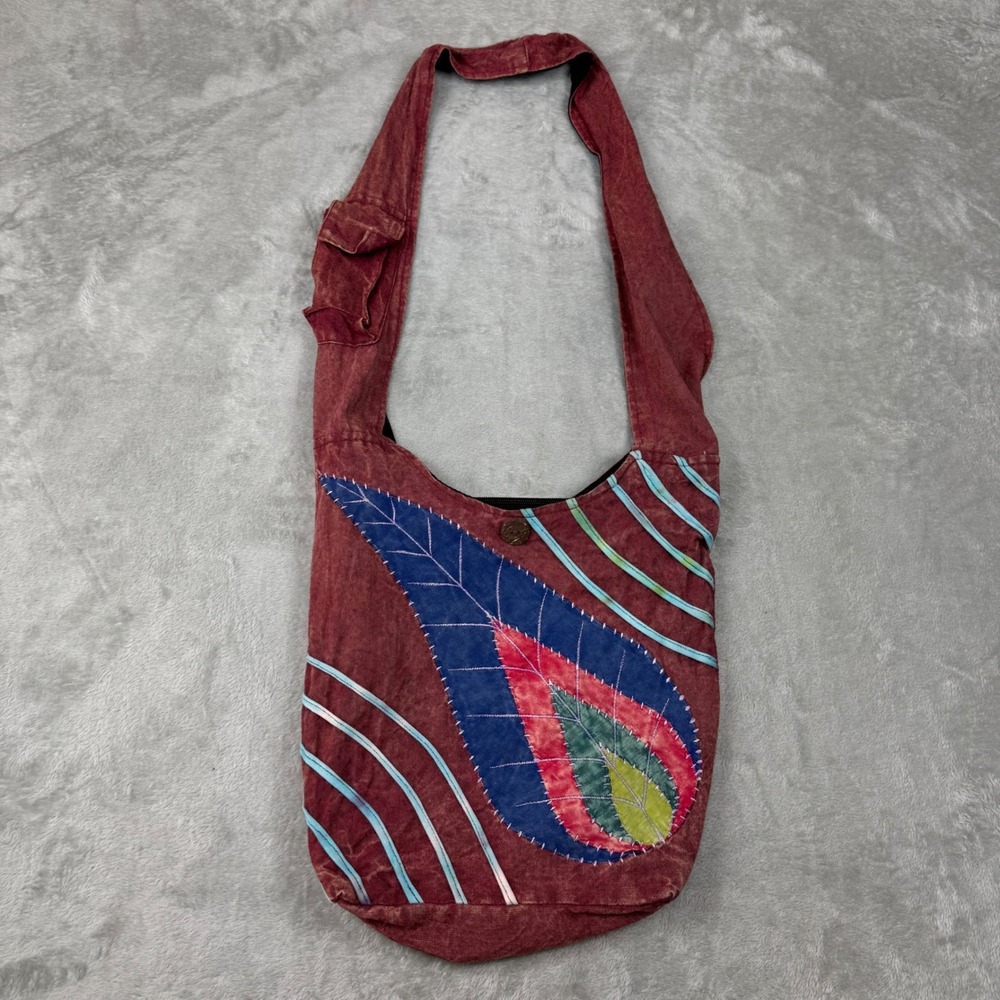 Kathmandu imports hobo shoulder bag 
Good used condition Boho earthy